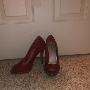 Red peep toe pumps